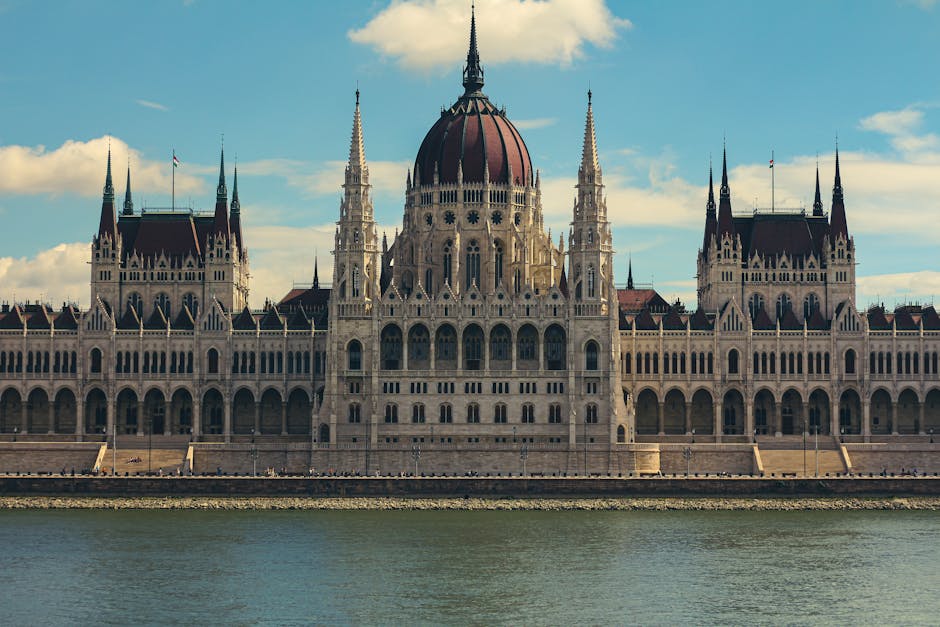 Majestic view of the Hungarian Parliament Building in Budapest along the Danube River.