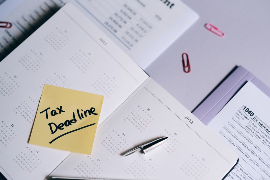 A wall calendar with a due date circled in red marker